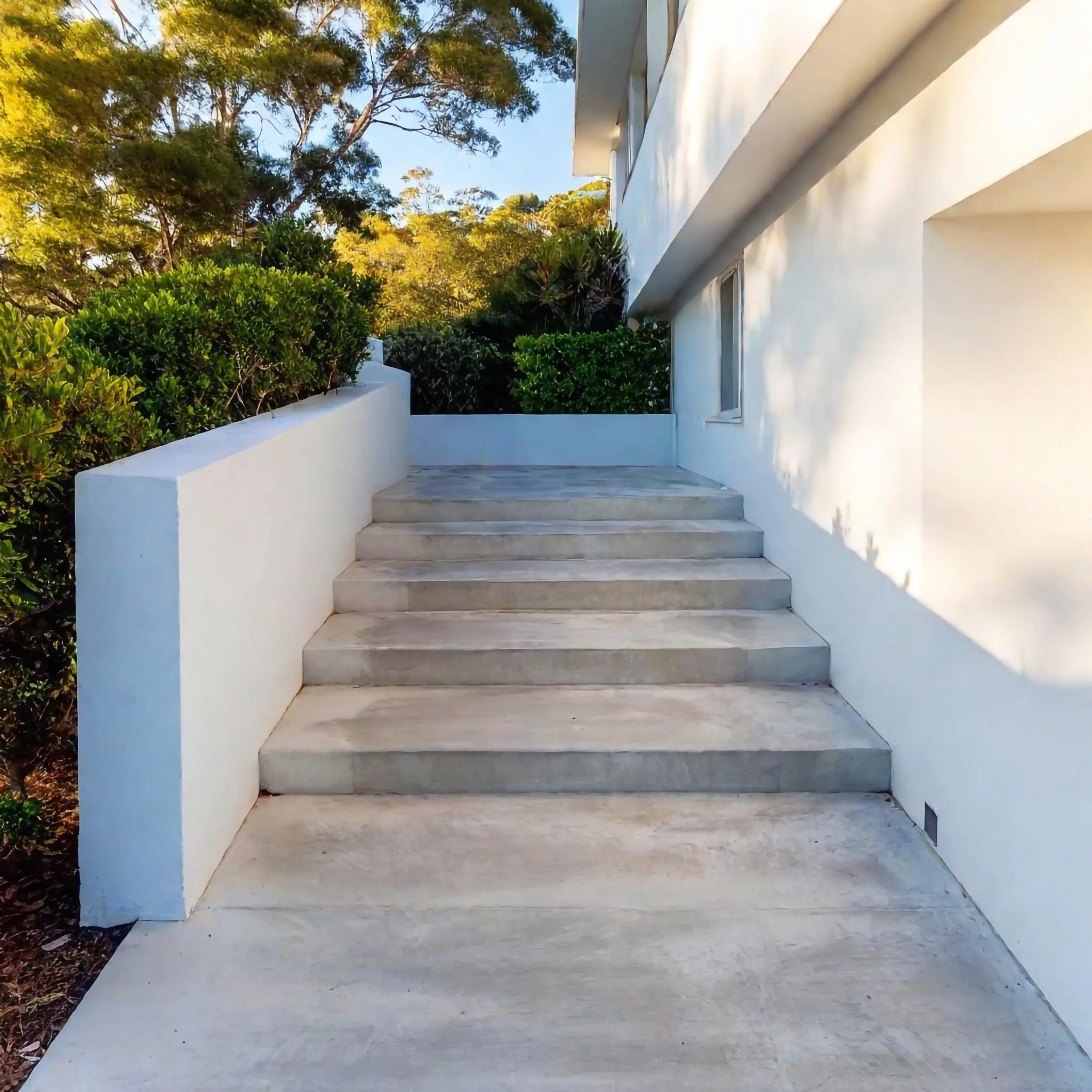 A set of durable concrete steps providing access between levels